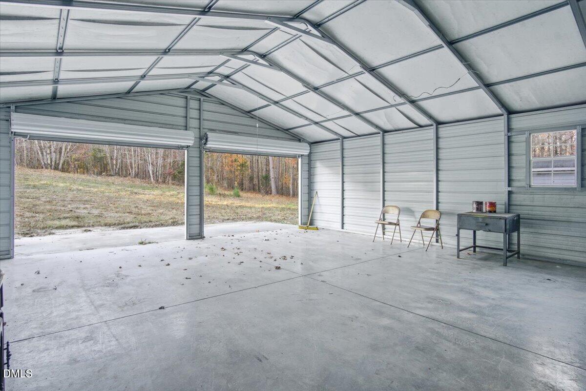 287 Moss Stock Farm Road Kittrell, NC 27544 - Photo 43 of 54 a view of an empty room with a window