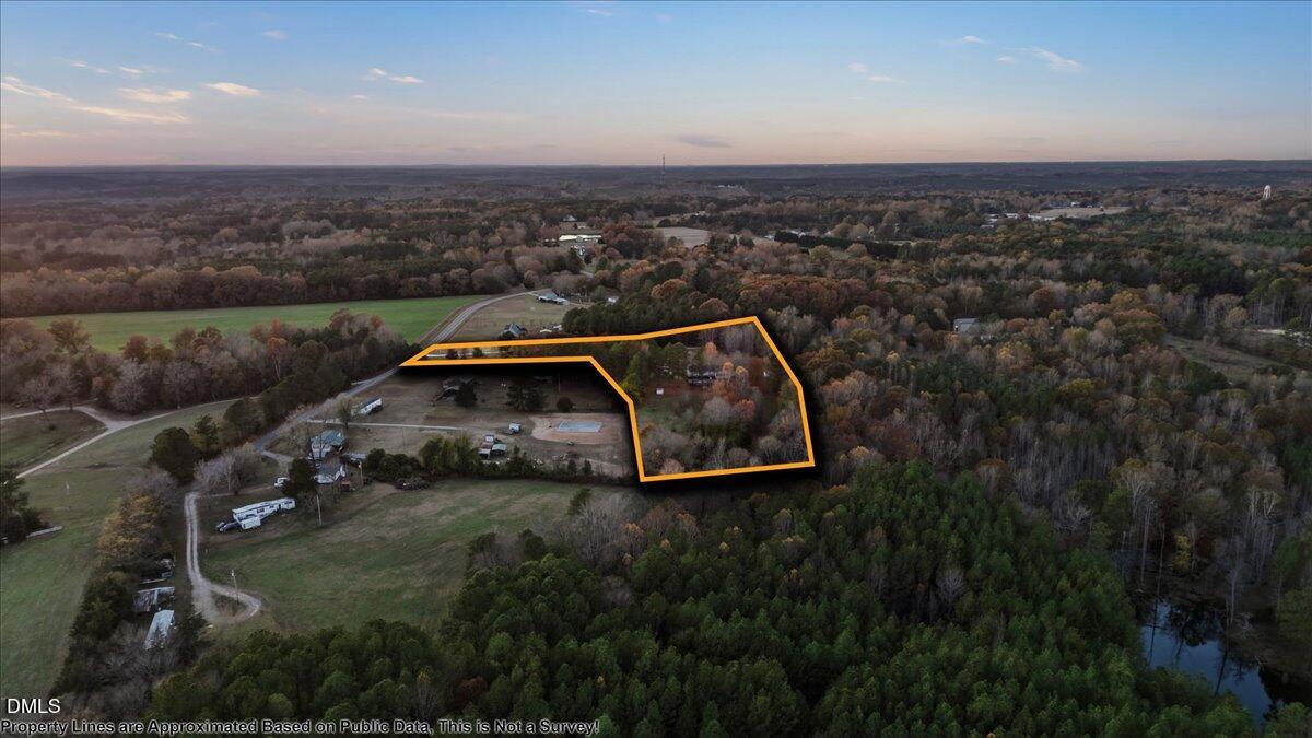287 Moss Stock Farm Road Kittrell, NC 27544 - Photo 53 of 54 an aerial view of a house with a yard