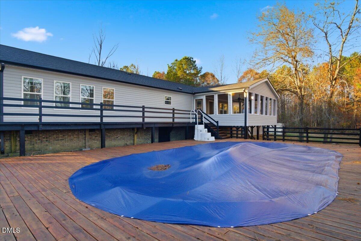 287 Moss Stock Farm Road Kittrell, NC 27544 - Photo 6 of 54 a view of a house with pool and sitting area