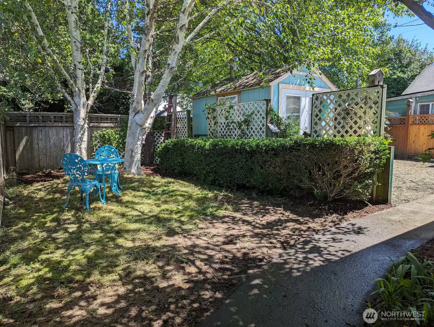 4106 Pacific Way Seaview, WA 98644 - Photo 20 of 21 a view of a chair and table in backyard