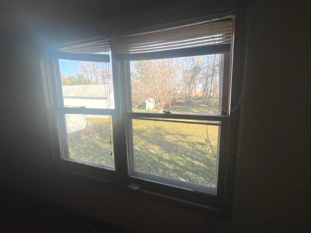 404 North Main Coleta, IL 61081 - Photo 23 of 32 a view of an empty room and window