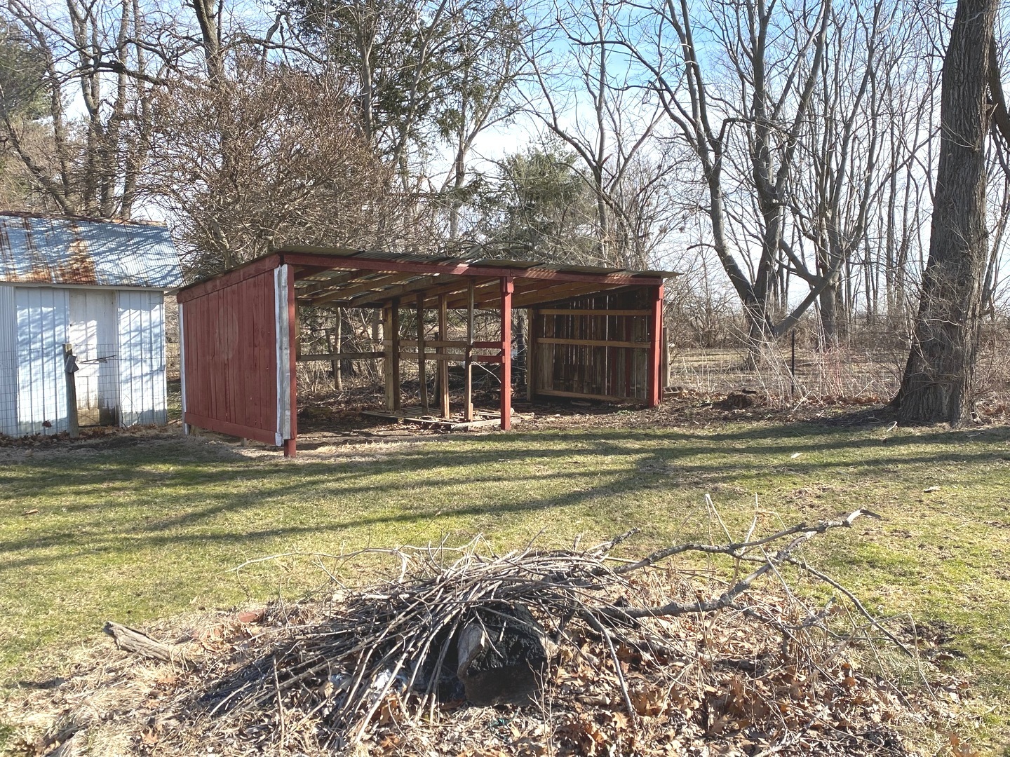 404 North Main Coleta, IL 61081 - Photo 29 of 32 a view of a house with a large tree and a yard