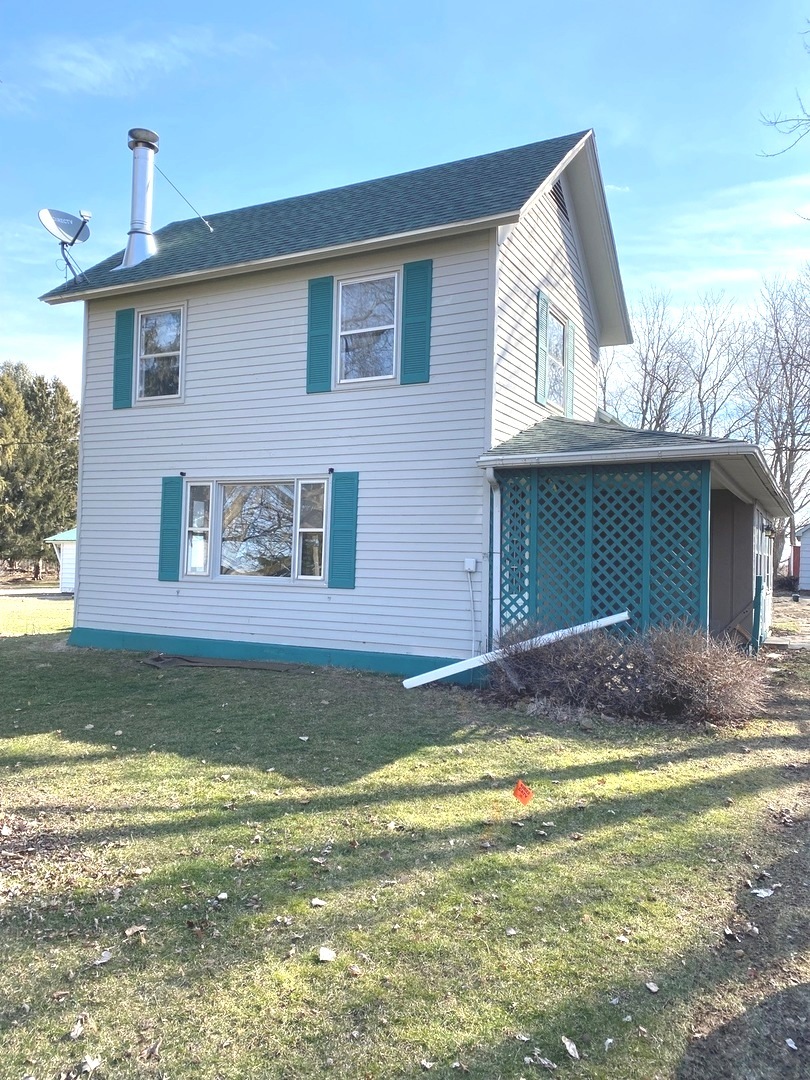 404 North Main Coleta, IL 61081 - Photo 32 of 32 a view of a house with a swimming pool
