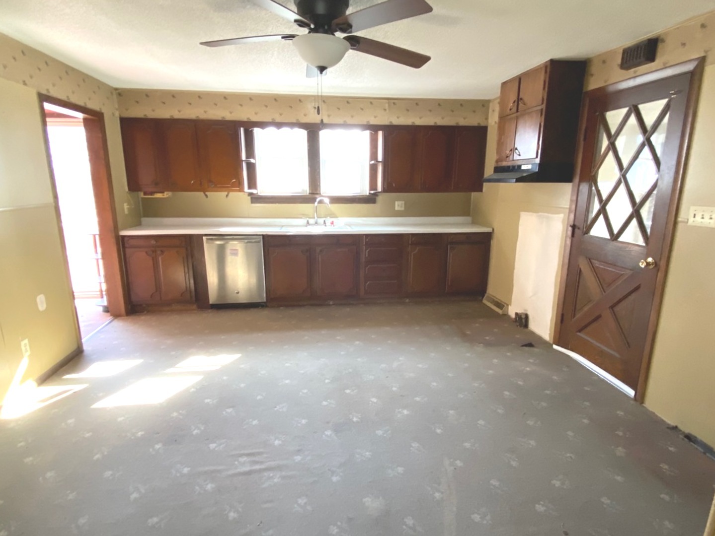 404 North Main Coleta, IL 61081 - Photo 6 of 32 a view of a kitchen with a sink and a window