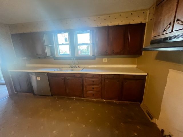 404 North Main Coleta, IL 61081 - Photo 7 of 32 a room with wooden cabinets and a fireplace