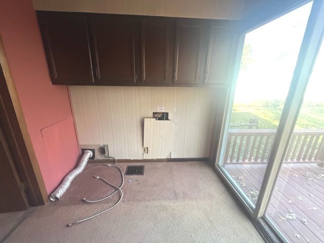 404 North Main Coleta, IL 61081 - Photo 10 of 32 a room with furniture and a window