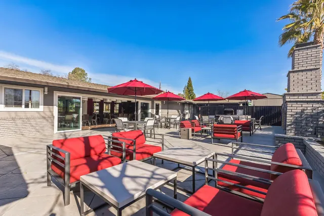 a view of outdoor dining space in the backyard