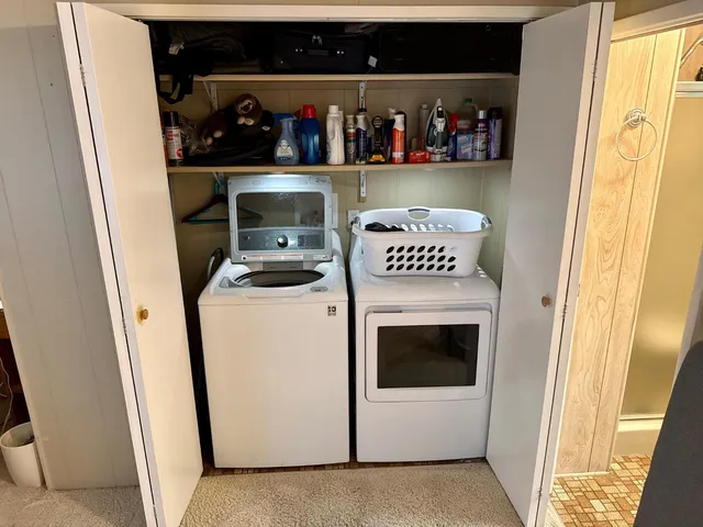 a kitchen with a washer and dryer