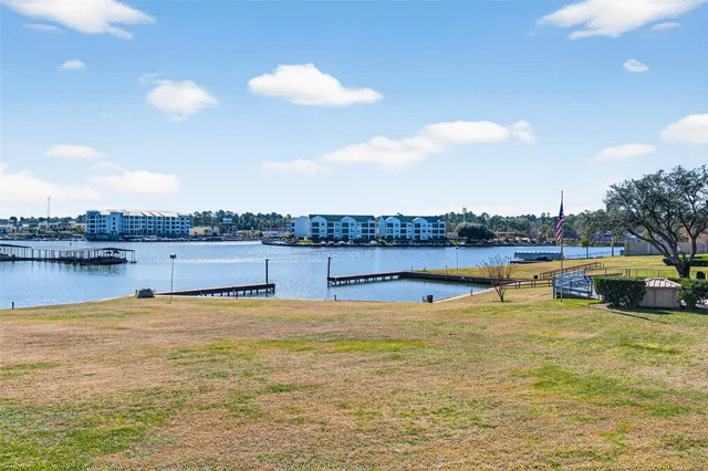 a view of a swimming pool with a lounge chair