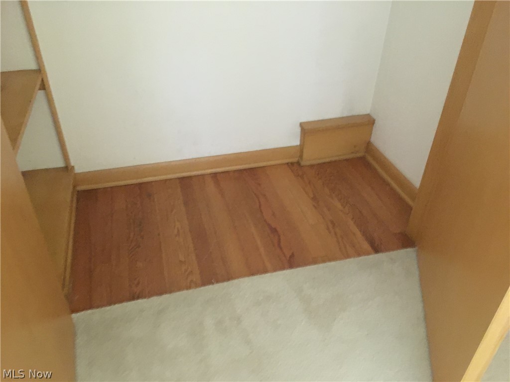 5952 Highland Road Cleveland, OH 44143 - Photo 16 of 34 Inside the bedroom closets you can see beautiful hardwood beneath the carpeting