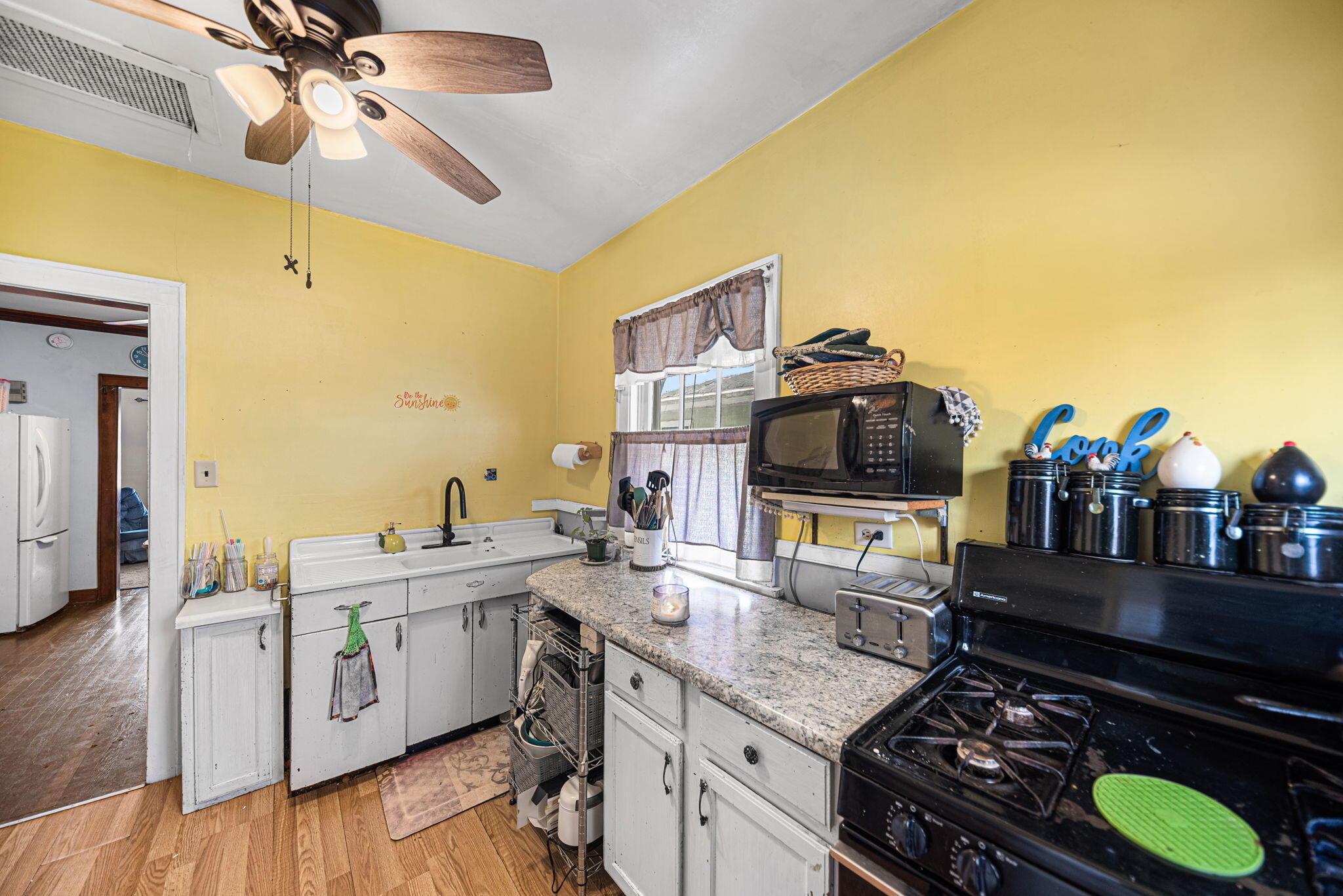 515 165th Street Hammond, IN 46324 - Photo 11 of 19 a kitchen with stainless steel appliances a sink and a stove