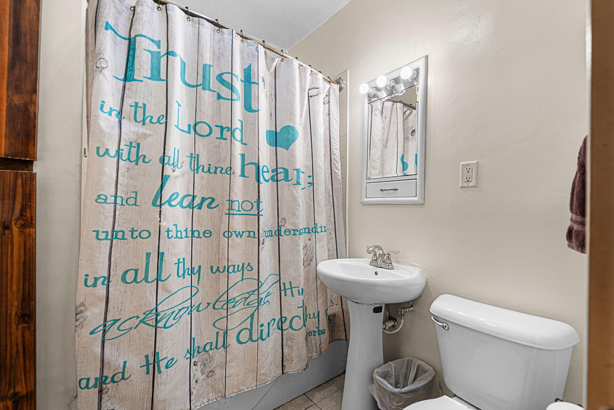 515 165th Street Hammond, IN 46324 - Photo 14 of 19 a bathroom with a sink toilet and shower