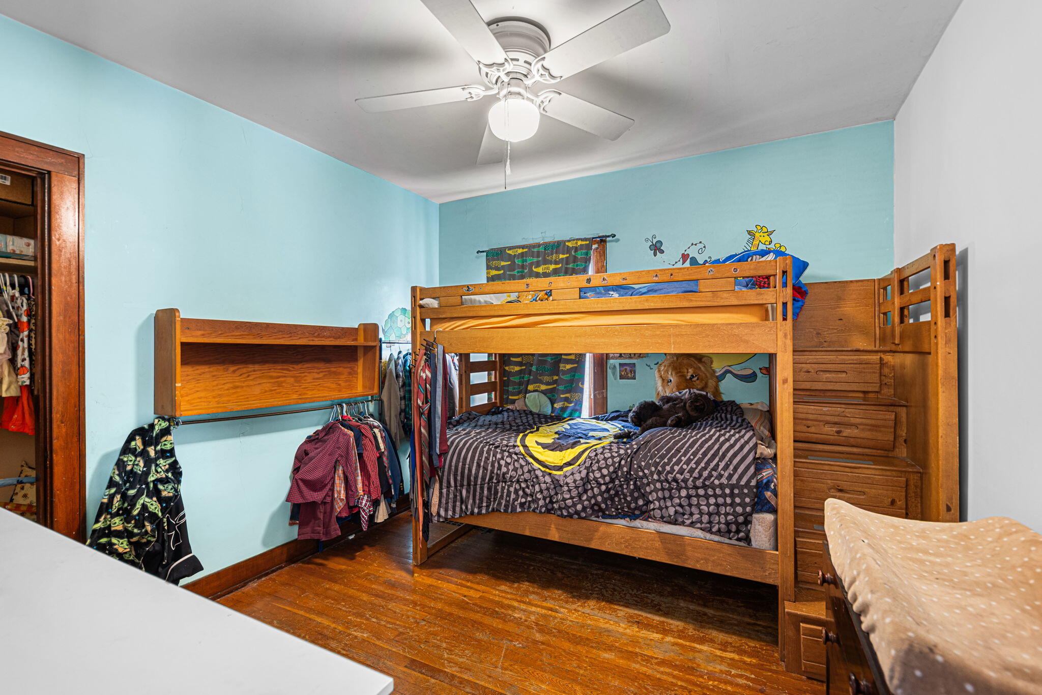 515 165th Street Hammond, IN 46324 - Photo 15 of 19 a bedroom with a bed and a chandelier