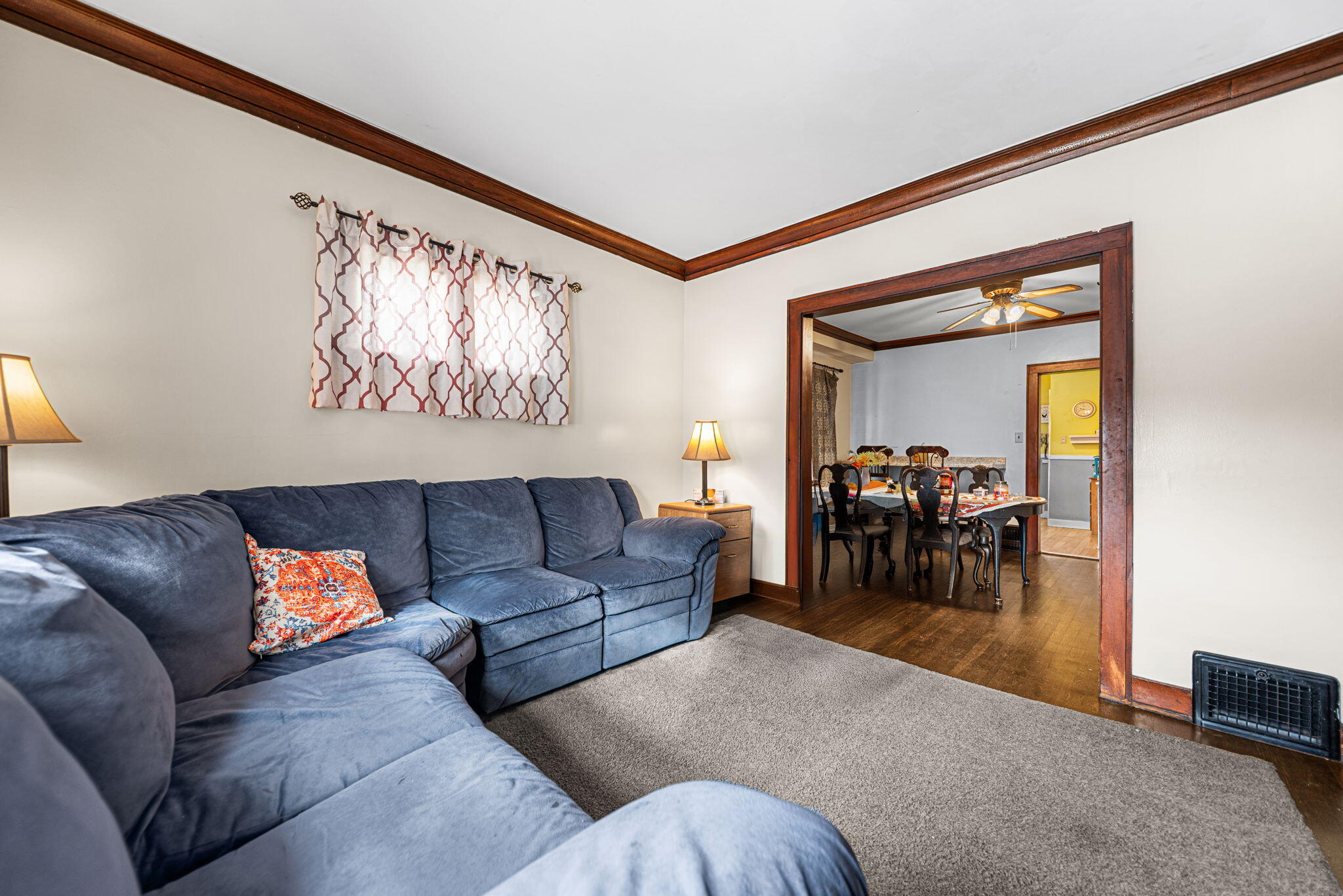 515 165th Street Hammond, IN 46324 - Photo 2 of 19 a living room with furniture and a flat screen tv