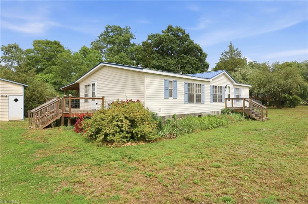 4790 Waynick Meadow Road Asheboro, NC 27205 - Photo 26 of 33 Another angle showing the front view of the home.