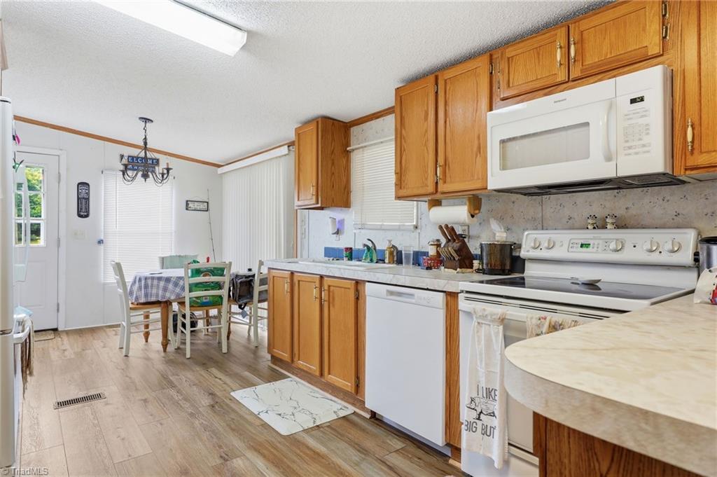 4790 Waynick Meadow Road Asheboro, NC 27205 - Photo 3 of 33 Kitchen with dining area.