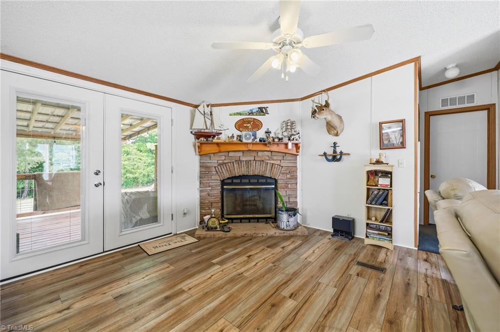 4790 Waynick Meadow Road Asheboro, NC 27205 - Photo 4 of 33 Family room/den with fireplace.