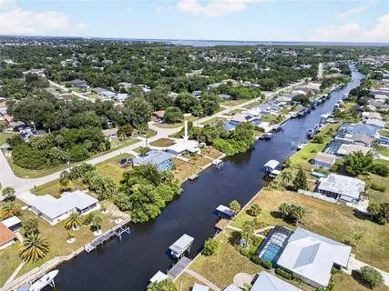 a view of a lake with a yard