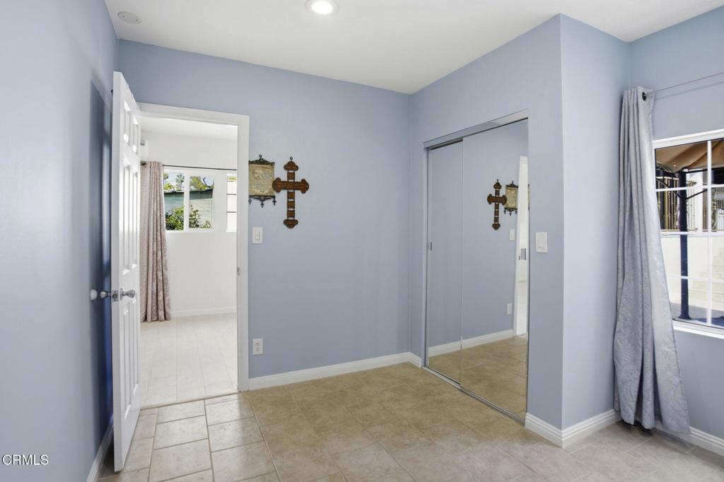 1606 Glenwood Road, Unit A Glendale, CA 91201 - Photo 17 of 28 hallway with wooden floor and front door