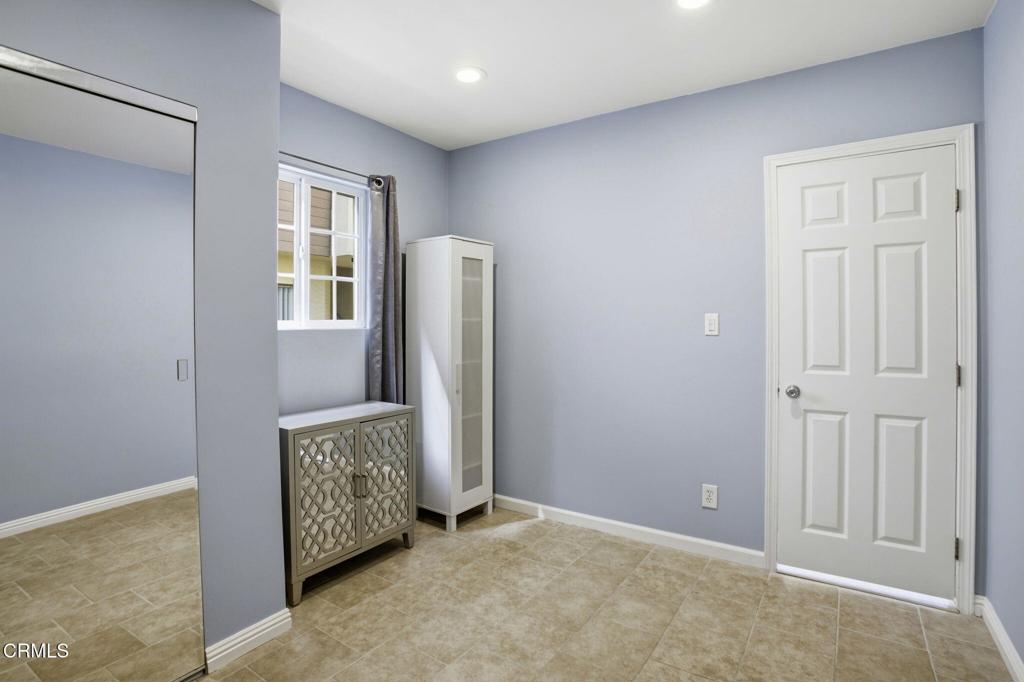 1606 Glenwood Road, Unit A Glendale, CA 91201 - Photo 21 of 28 an empty room with windows