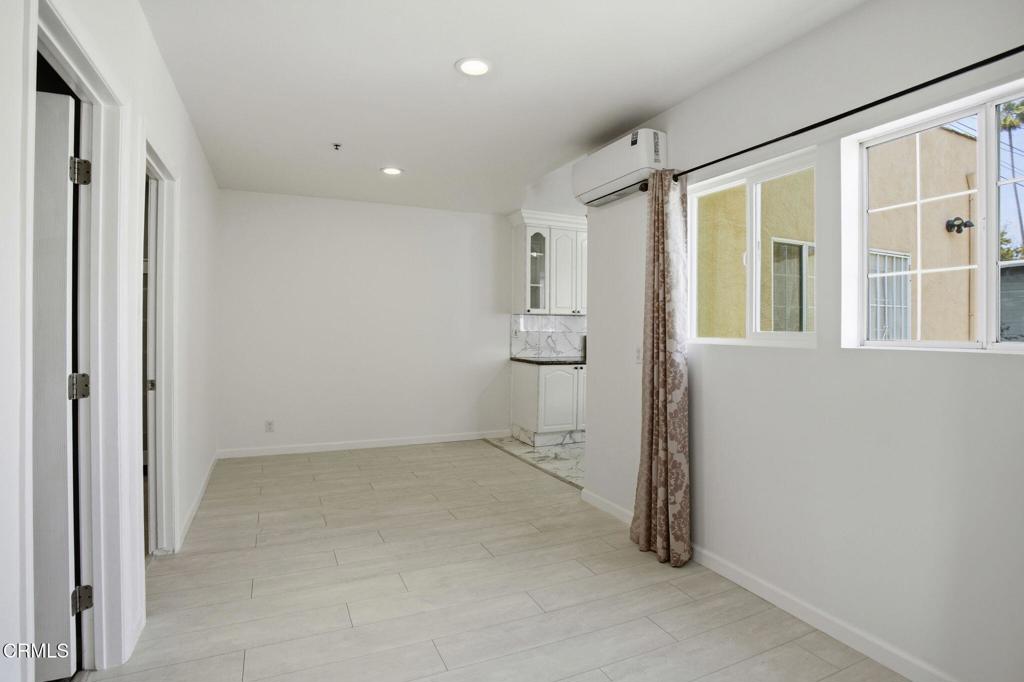 1606 Glenwood Road, Unit A Glendale, CA 91201 - Photo 4 of 28 an empty room with windows