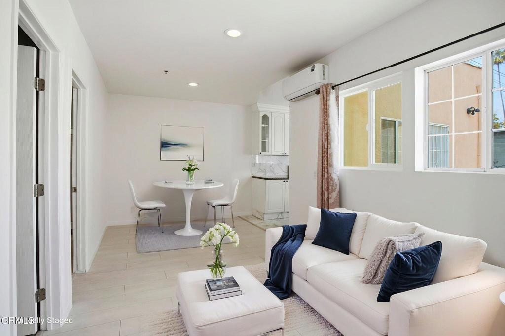 1606 Glenwood Road, Unit A Glendale, CA 91201 - Photo 5 of 28 a living room with furniture and a table