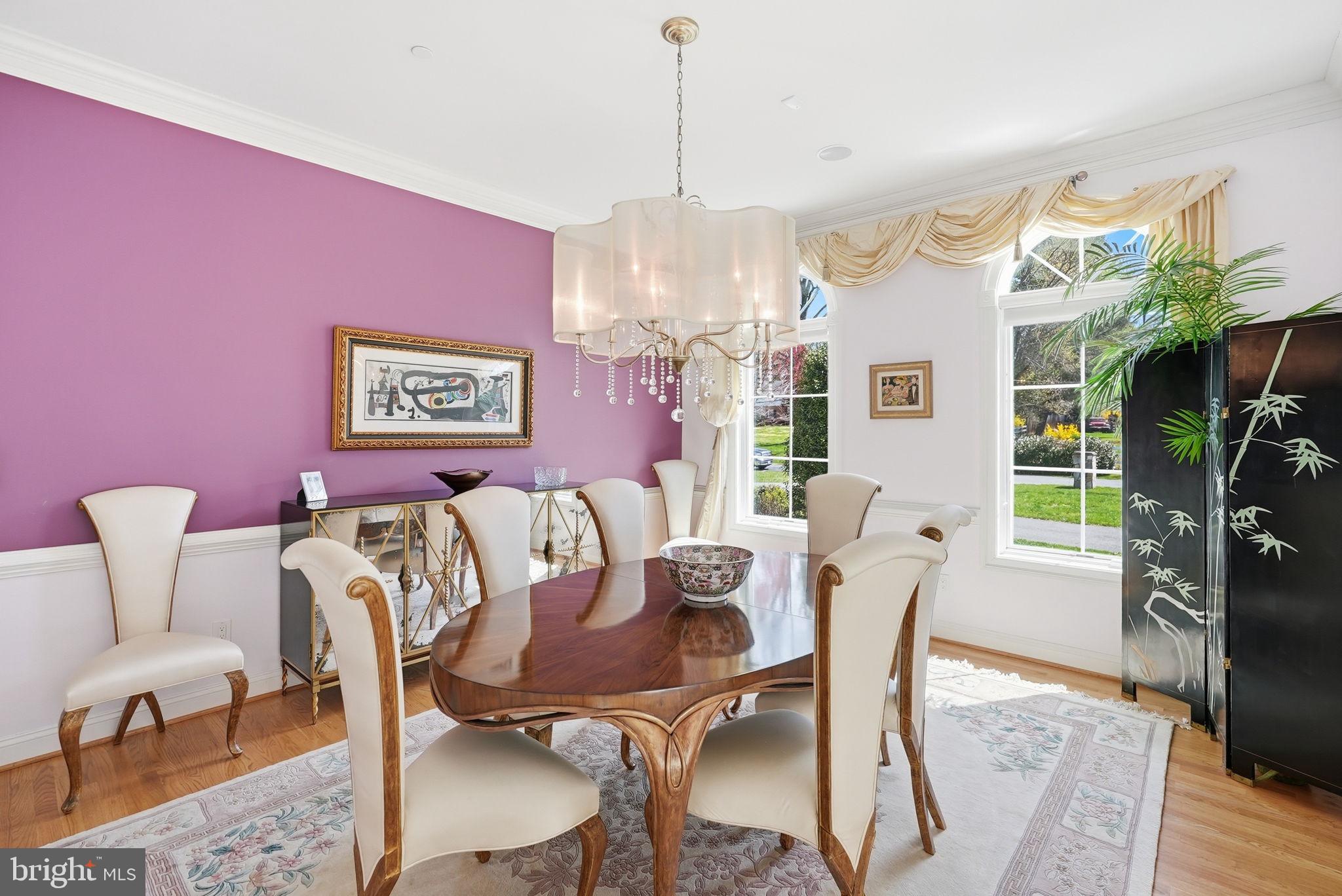 10708 Lockland Road Potomac, MD 20854 - Photo 29 of 69 a view of a dining room with furniture and chandelier