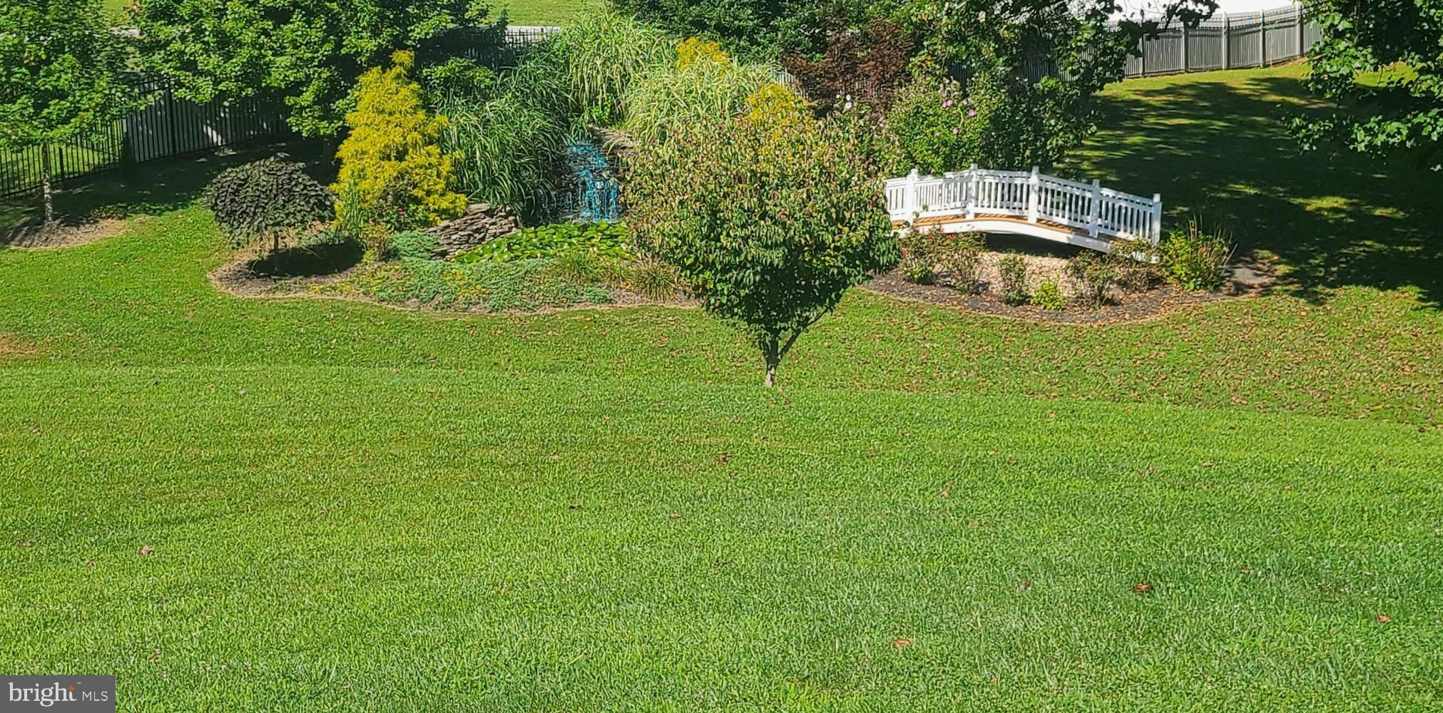 10708 Lockland Road Rockville, MD 20854 - Photo 58 of 64 Waterfall and Bridge