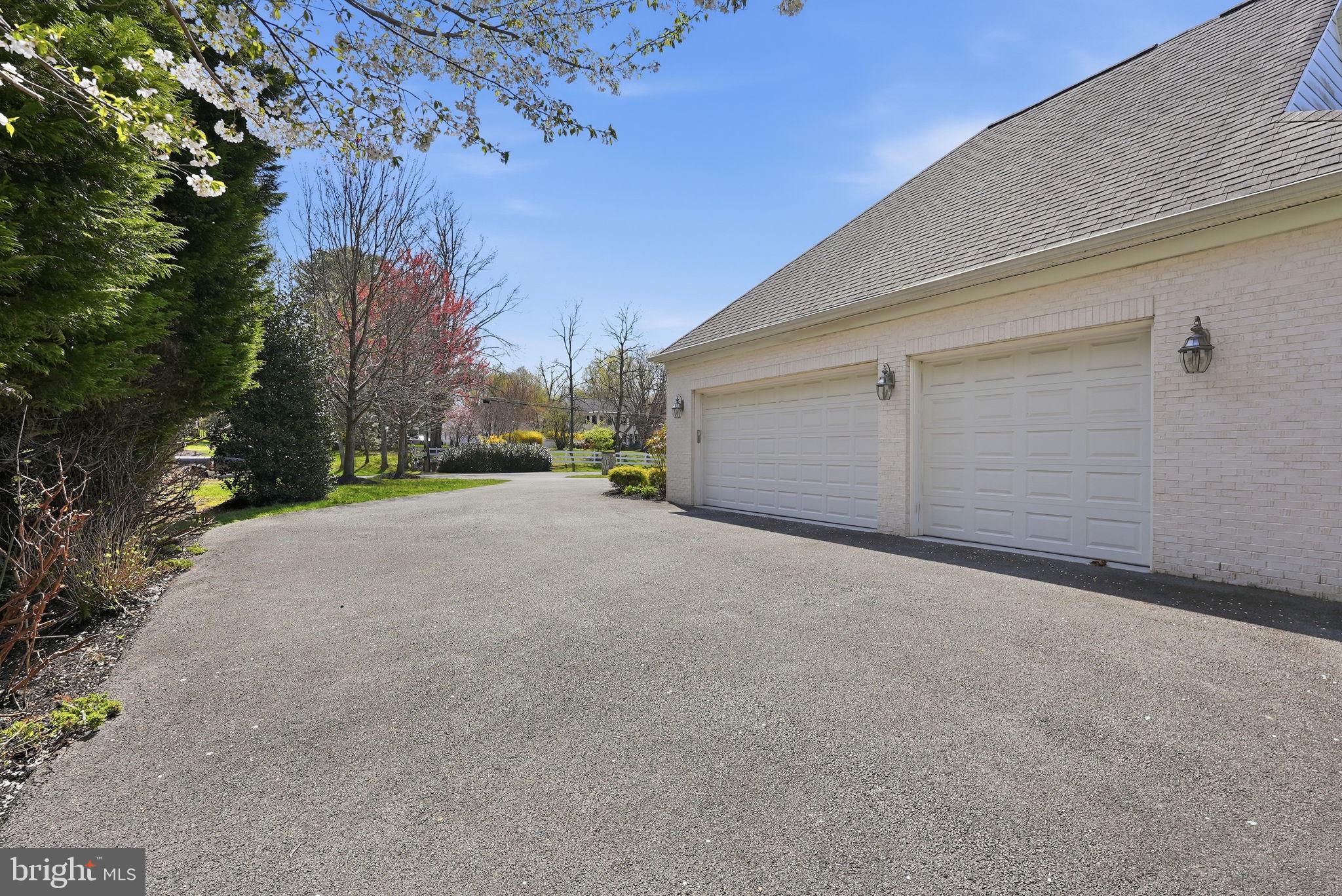 10708 Lockland Road Potomac, MD 20854 - Photo 60 of 69 a view of a road with a building in the background