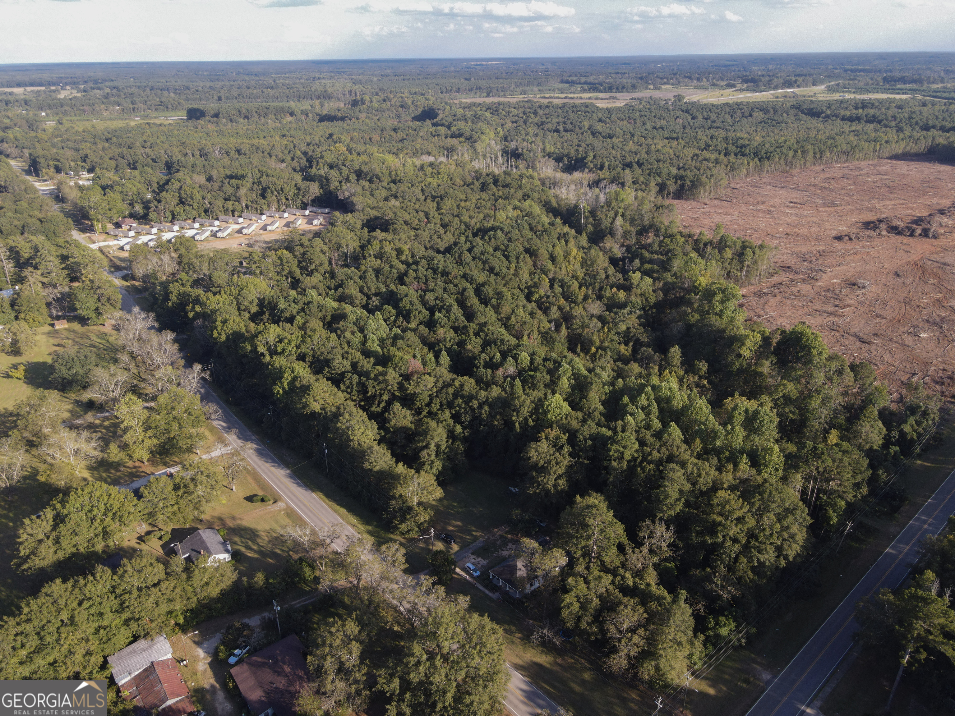 908 East McCarty Street Sandersville, GA 31082 - Photo 20 of 20 a view of a road with an outdoor space