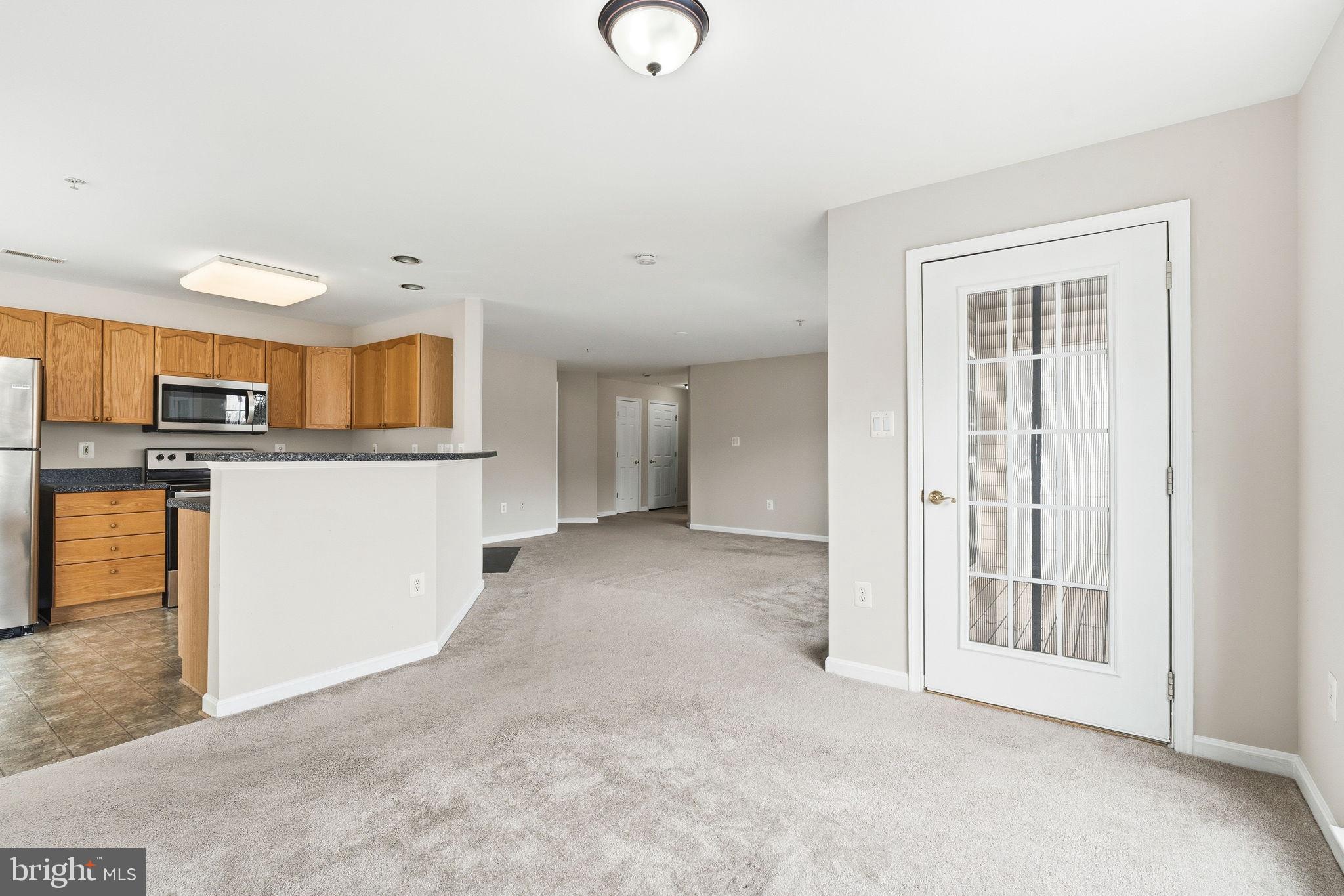 2503 Coleridge Drive, Unit 2A Frederick, MD 21702 - Photo 11 of 42 Dining Room with Deck Access