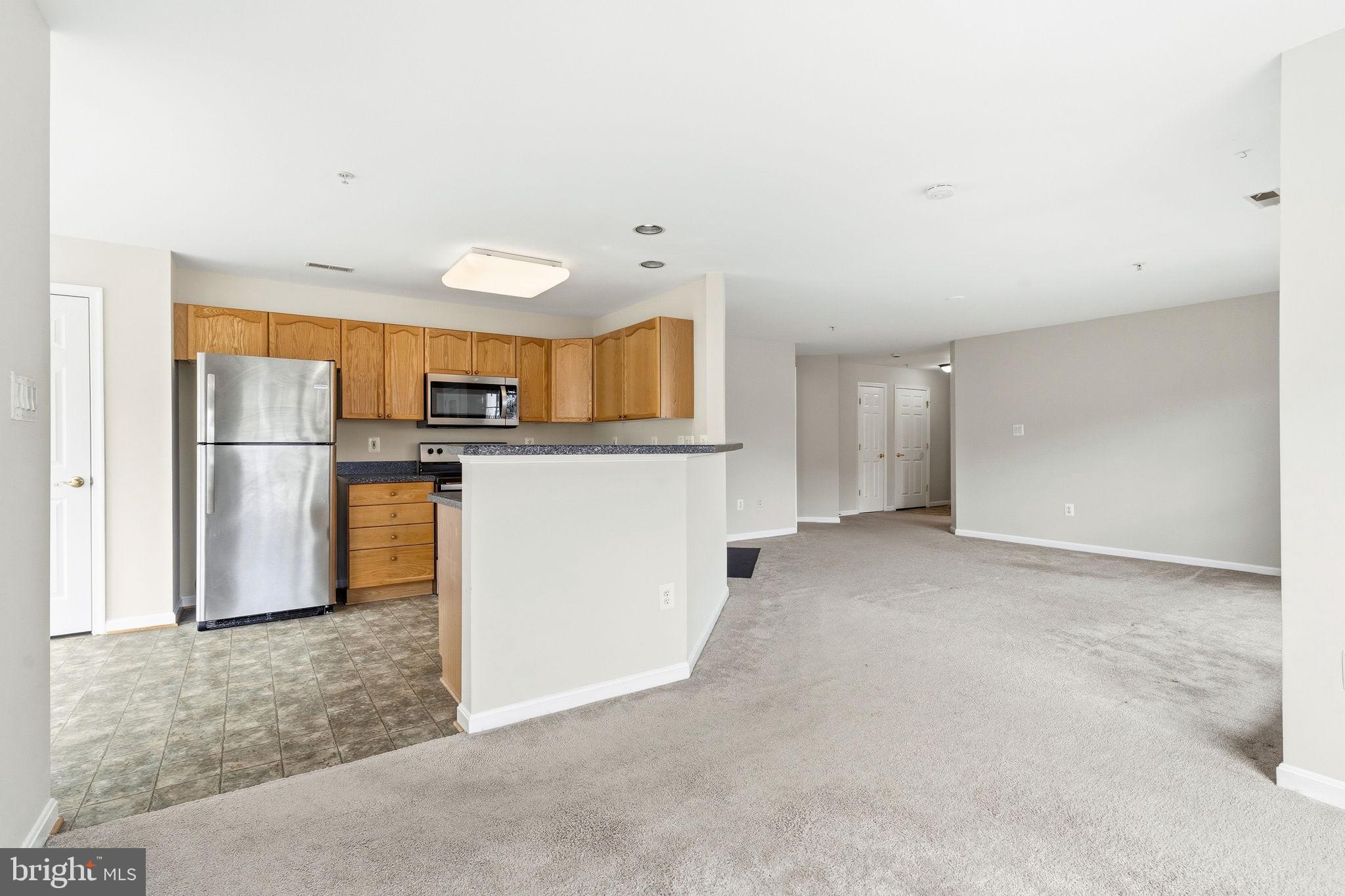 2503 Coleridge Drive, Unit 2A Frederick, MD 21702 - Photo 14 of 42 Kitchen/Dining Room/Living Room