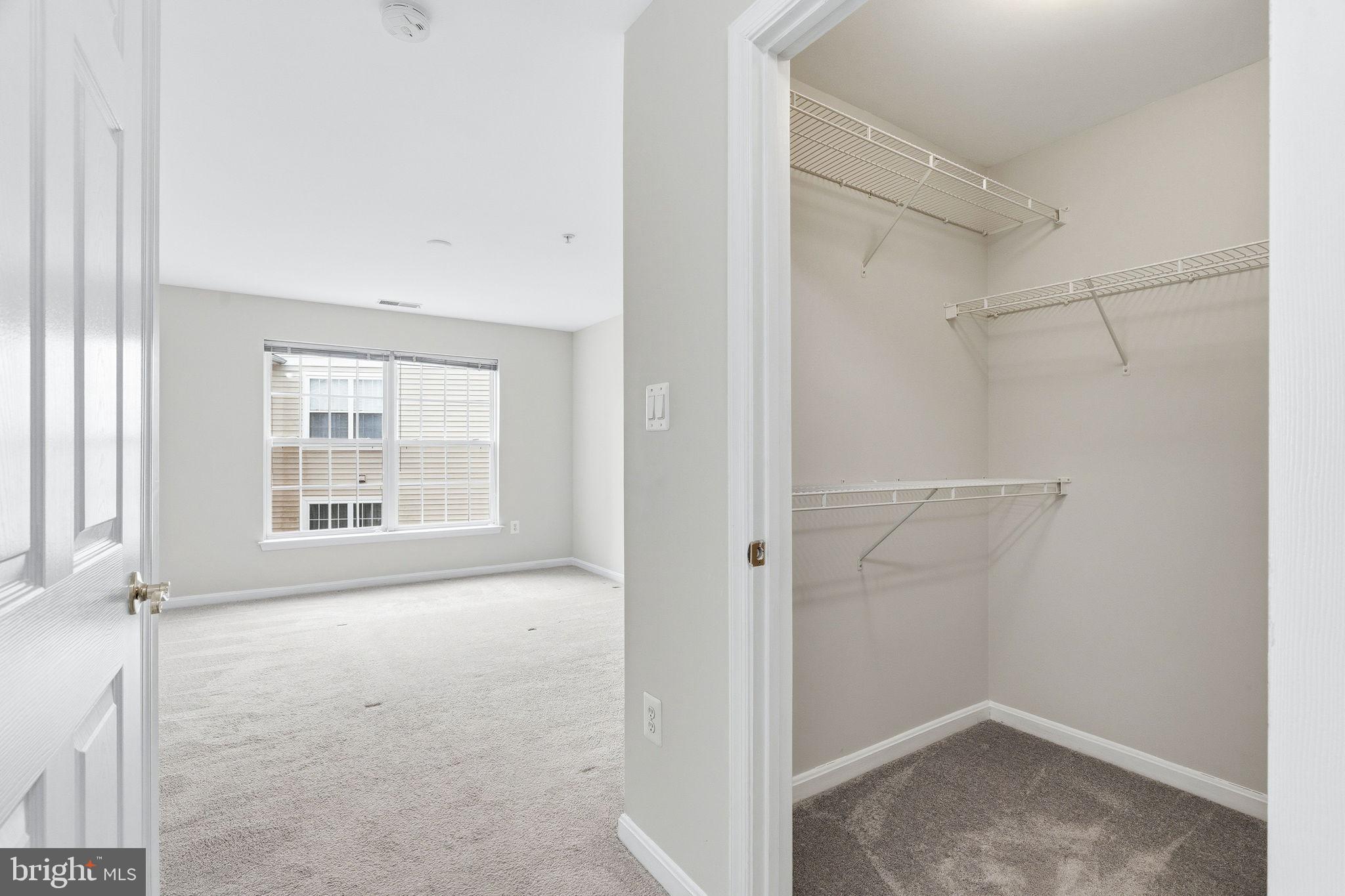 2503 Coleridge Drive, Unit 2A Frederick, MD 21702 - Photo 20 of 42 Primary Closet and Bedroom