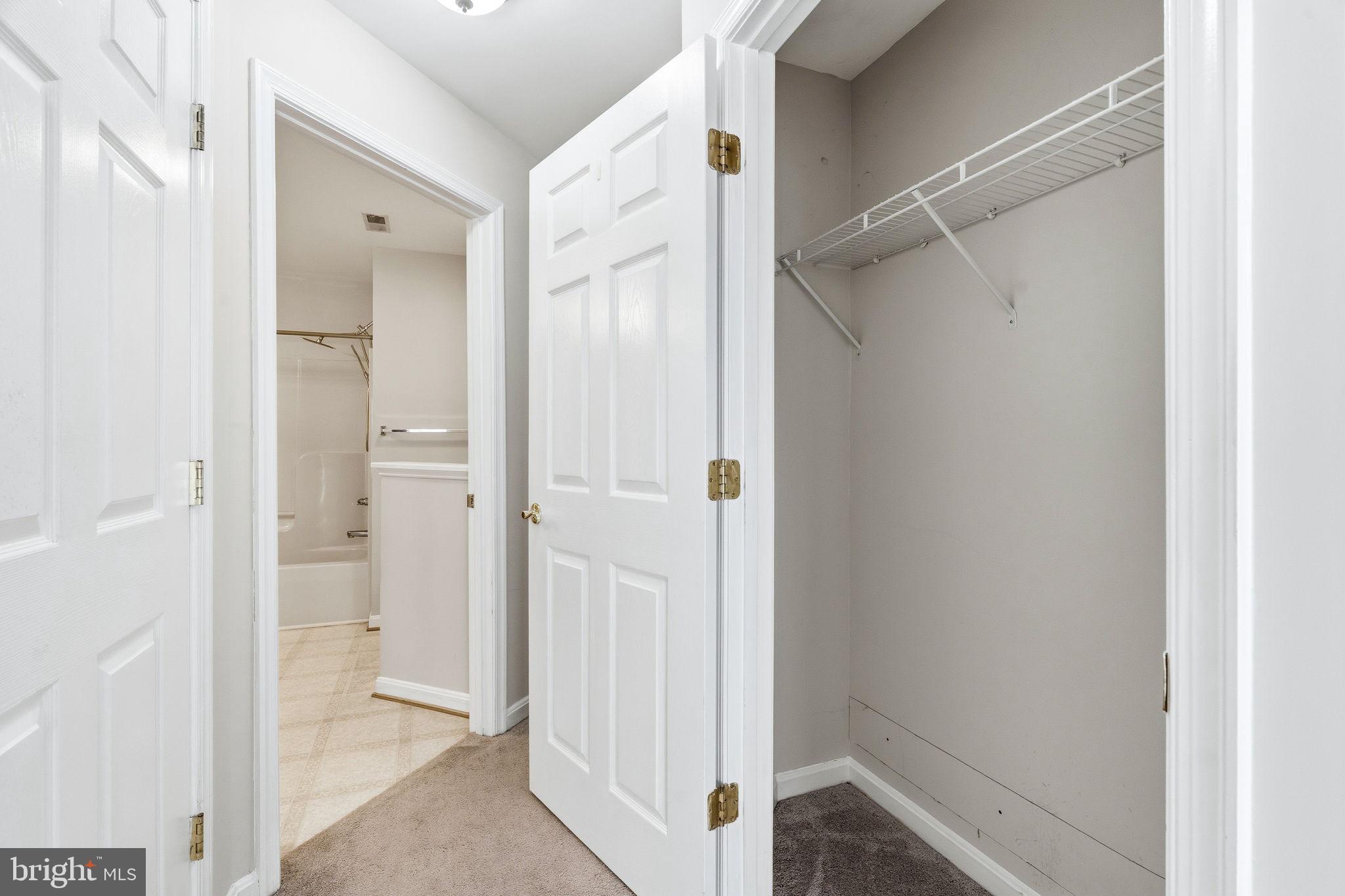 2503 Coleridge Drive, Unit 2A Frederick, MD 21702 - Photo 21 of 42 2nd Primary Closet and Primary Bathroom
