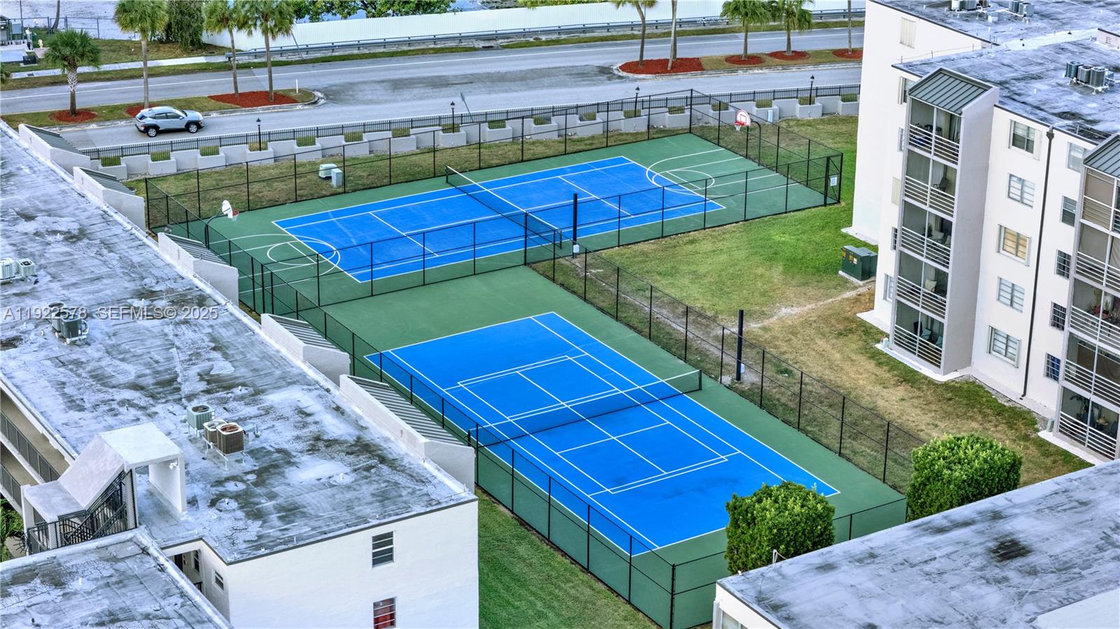 14195 Southwest 87th Street, Unit B115 Miami, FL 33183 - Photo 2 of 22 a view of a backyard with sitting area