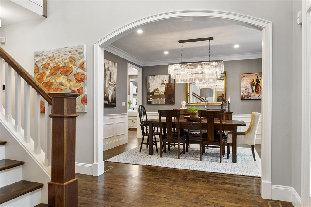27 Sherman Street Lexington, MA 02420 - Photo 13 of 30 a view of a dining room with furniture window and wooden floor