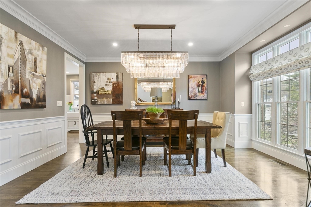 27 Sherman Street Lexington, MA 02420 - Photo 14 of 30 a view of a dining room with furniture window and wooden floor
