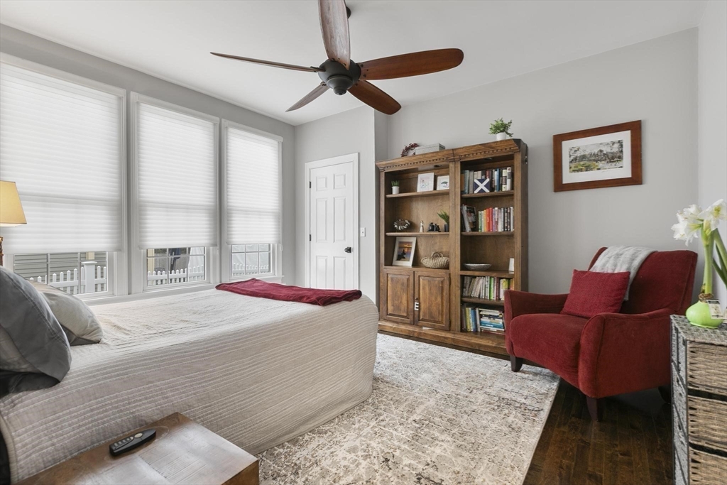 27 Sherman Street Lexington, MA 02420 - Photo 15 of 30 a bedroom with a bed furniture and a large window