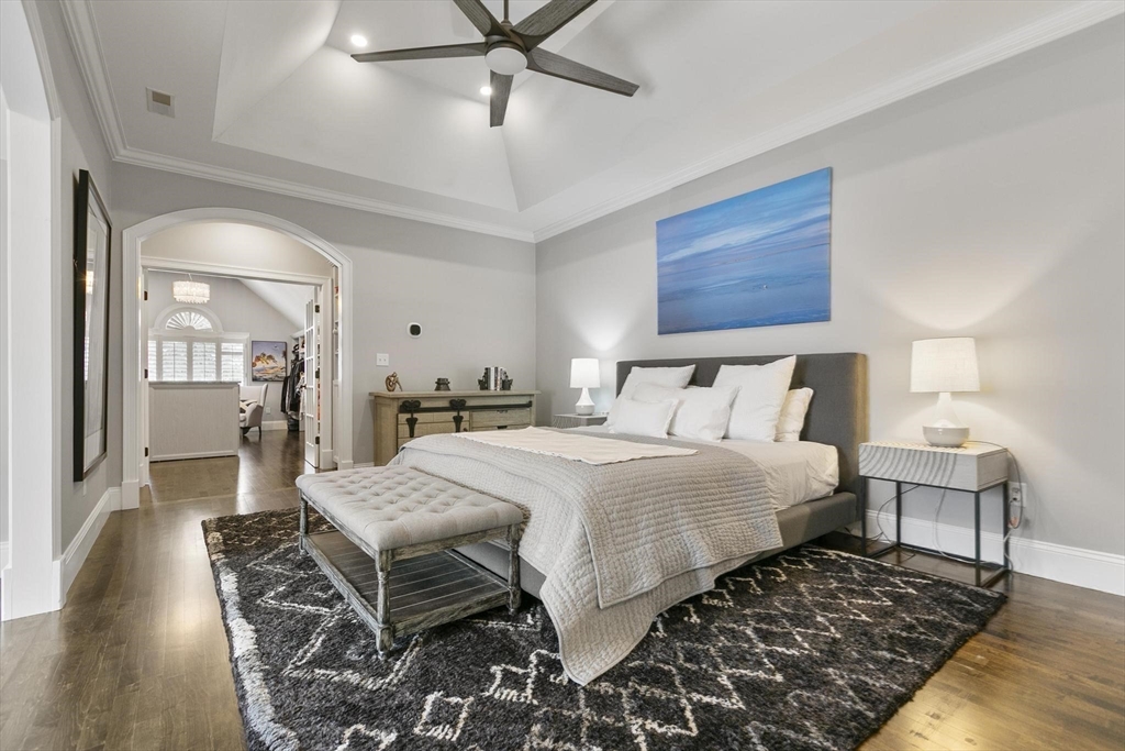 27 Sherman Street Lexington, MA 02420 - Photo 17 of 30 a bedroom with a bed and wooden floor