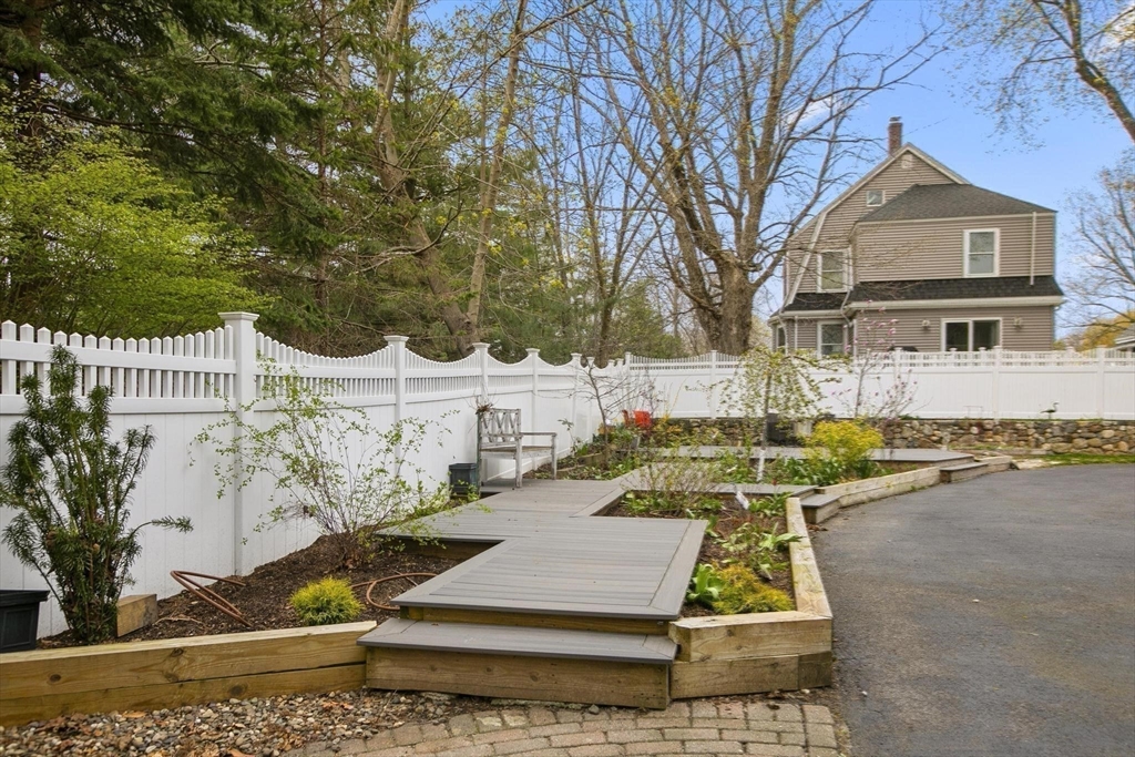 27 Sherman Street Lexington, MA 02420 - Photo 29 of 30 a view of a swimming pool with a patio