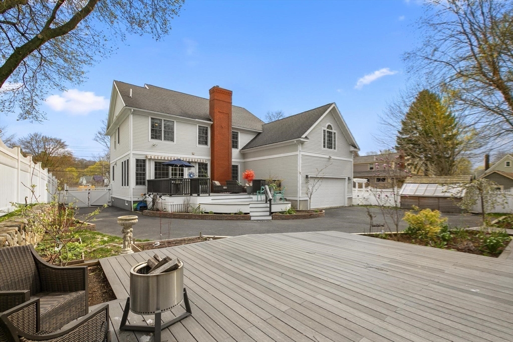 27 Sherman Street Lexington, MA 02420 - Photo 30 of 30 a front view of a house with a yard