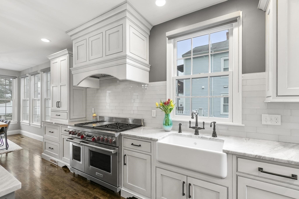 27 Sherman Street Lexington, MA 02420 - Photo 8 of 30 a kitchen with cabinets and appliances