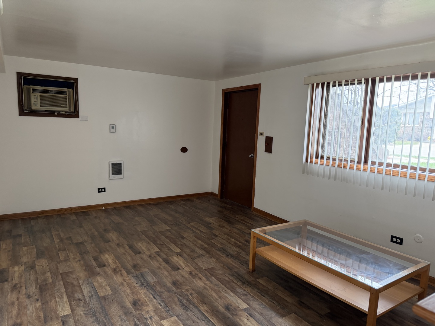 7226 West 63rd Place, Unit 1 Summit, IL 60501 - Photo 3 of 10 a room with window and a wooden floor