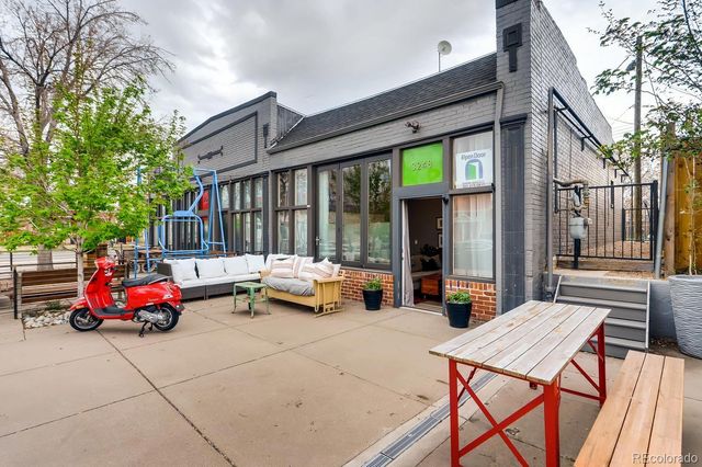 a car parked in front of a building