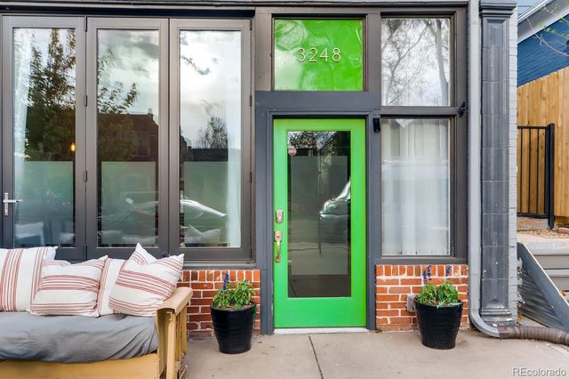 a outdoor living space with furniture and a garden