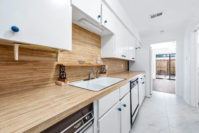 a bathroom with a sink and a bathtub