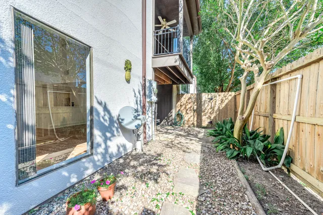 a backyard of a house with seating space