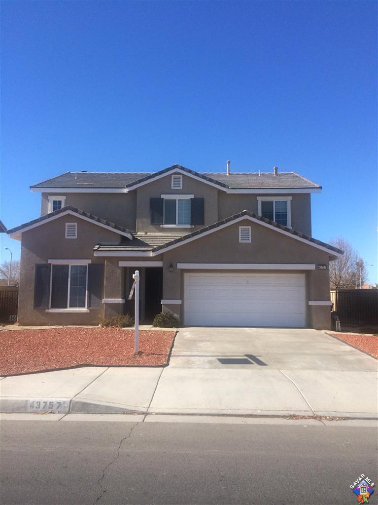 43757 Rucker Street Lancaster, CA 93535 - Photo 1 of 8 a front view of a house with a yard