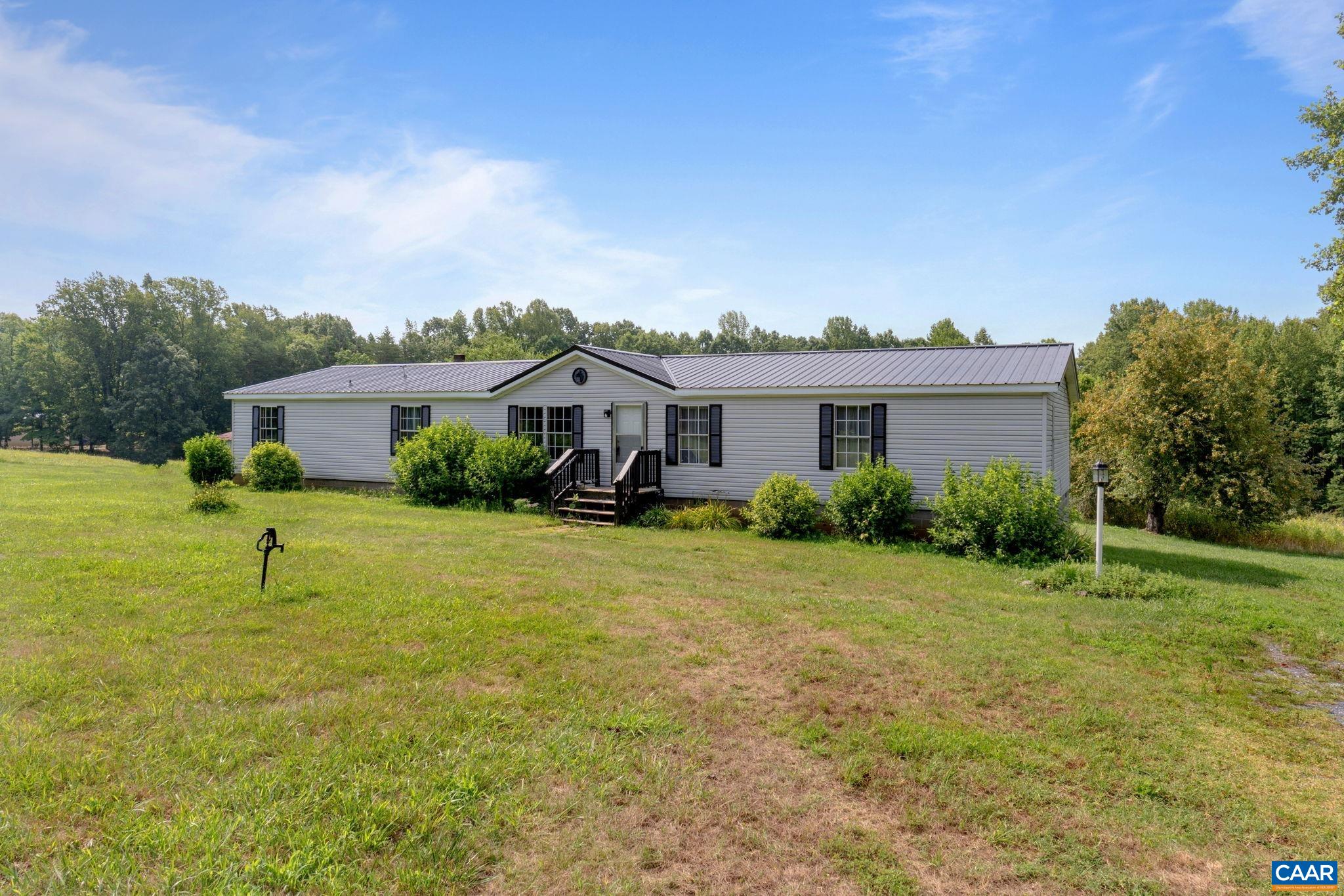 1990 Seven Eleven Road Cumberland, VA 23040 - Photo 1 of 21 a house view with a garden space