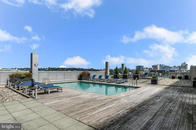 a view of a terrace with sitting area